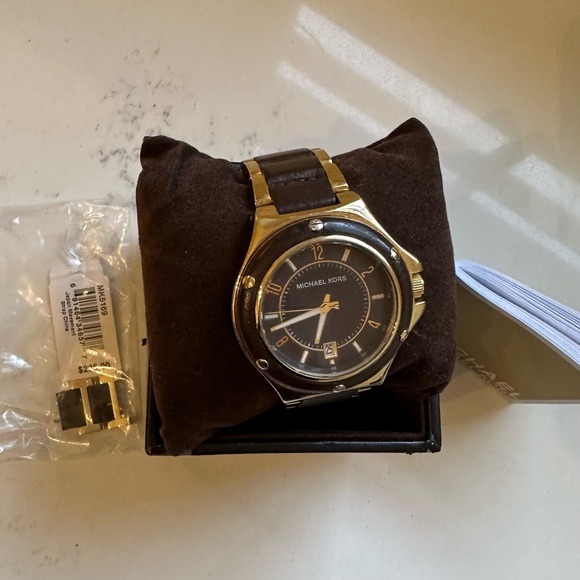 Michael kors watch. Gold and chocolate brown.